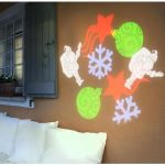 Projecteur de Noël noir LED - motifs flocons, étoiles, Père Noël